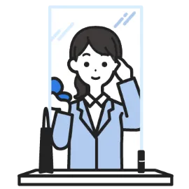 身だしなみをチェックする女性のイメージ