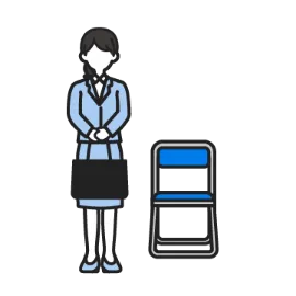 椅子の横に立つ女性のイメージ